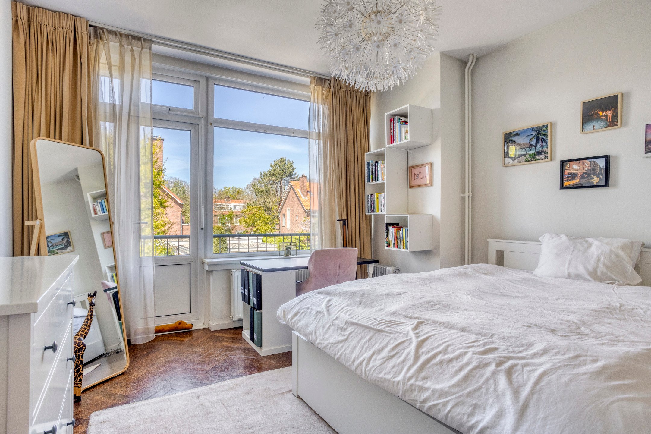 Slaapkamer met balkon